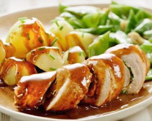 Kalfsschnitzel, gevuld met spinazie en roomkaas